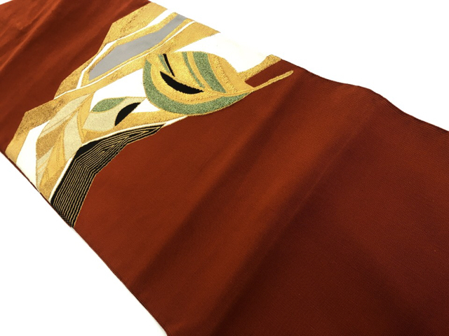 リサイクル　綴れ草葉模様織出し名古屋帯